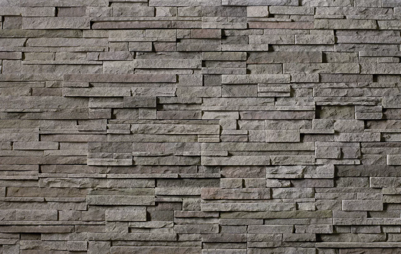 product swatch of dark grey textured stone