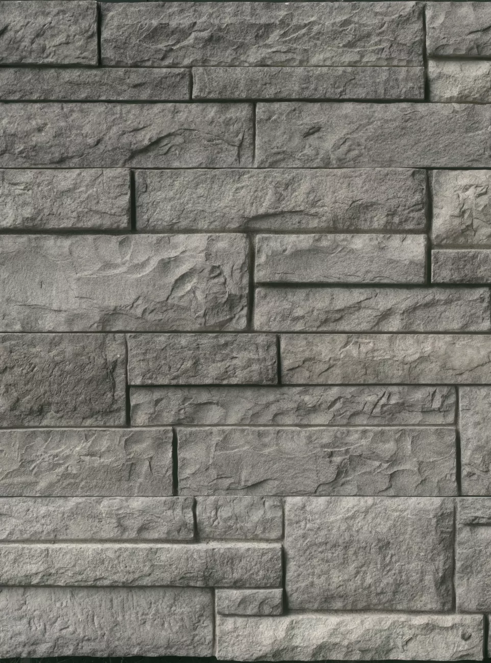 close up image of grey stone siding